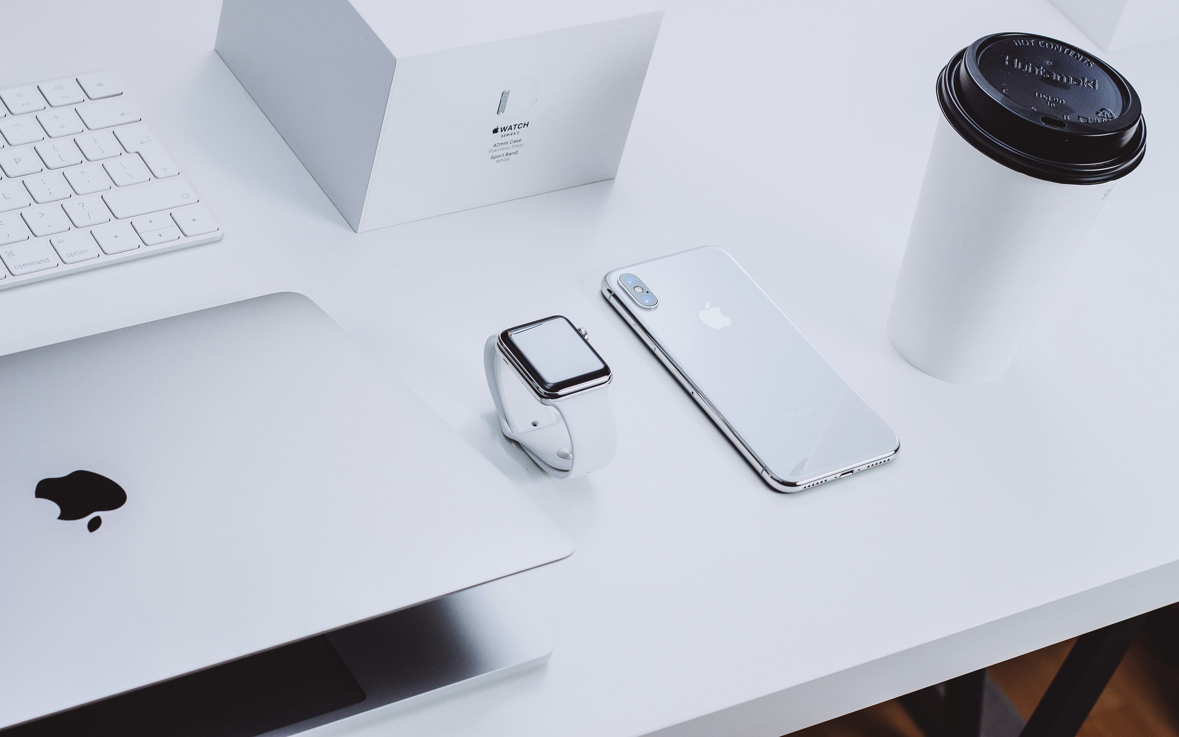 Main Image: Apple products on a white table