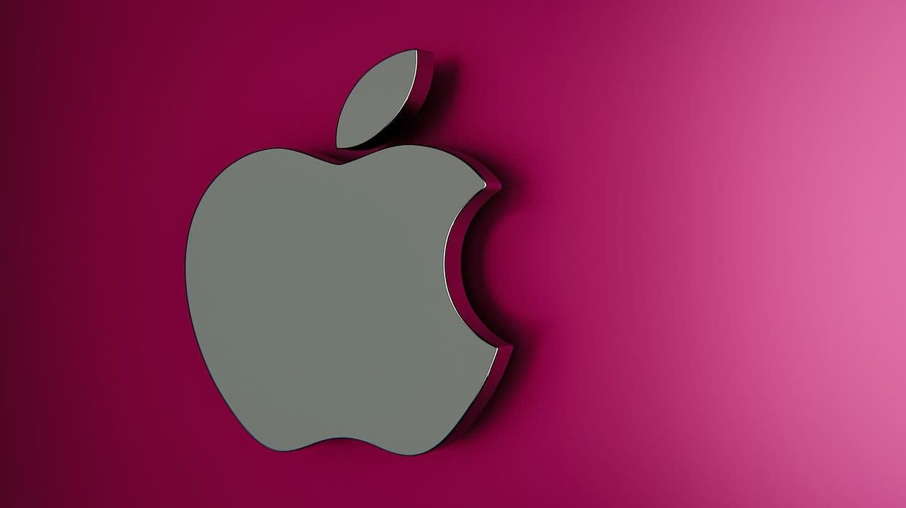 Main image for post. A silver Apple Inc. logo against a pink background.