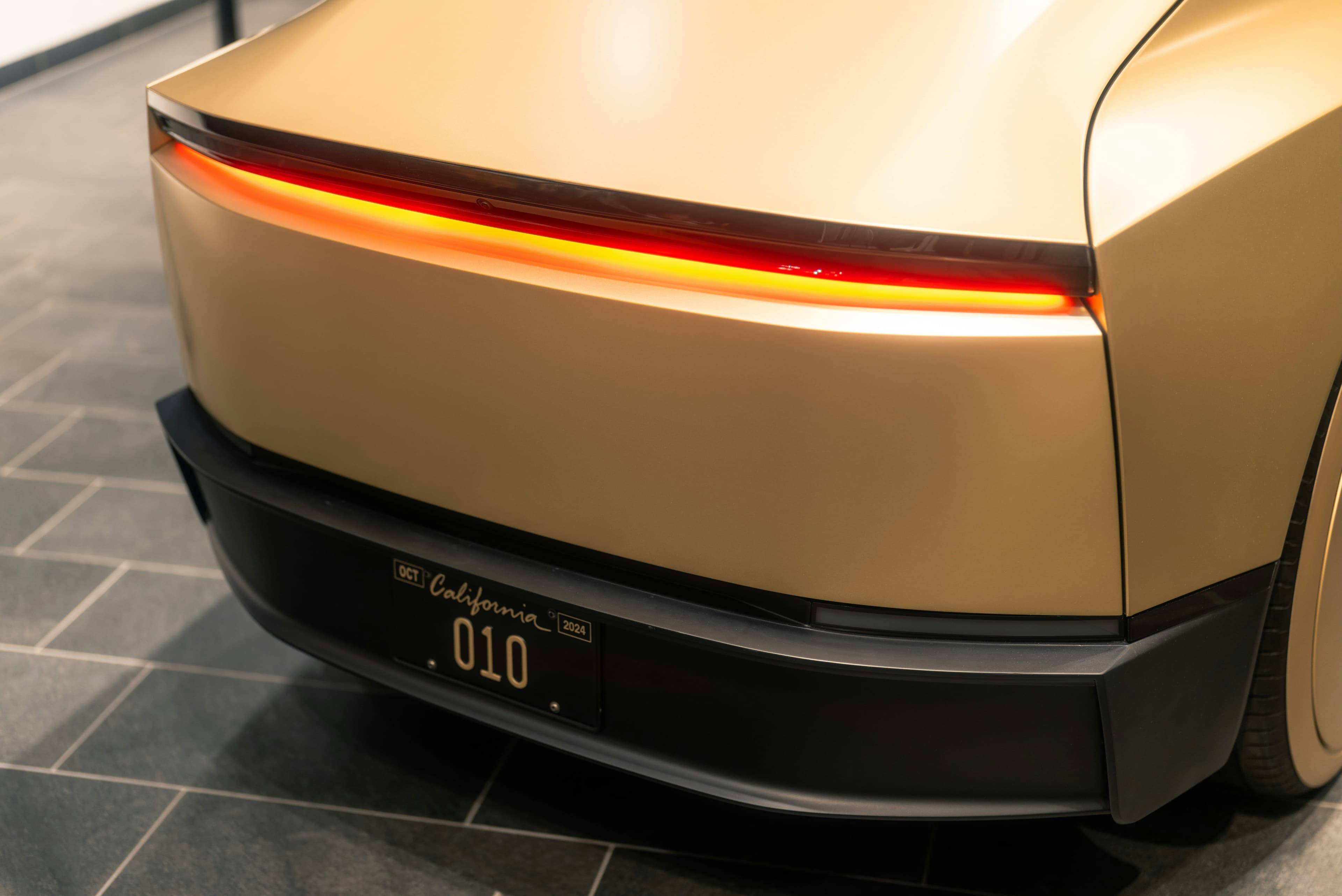 Main Image: Rear end of a Robotaxi