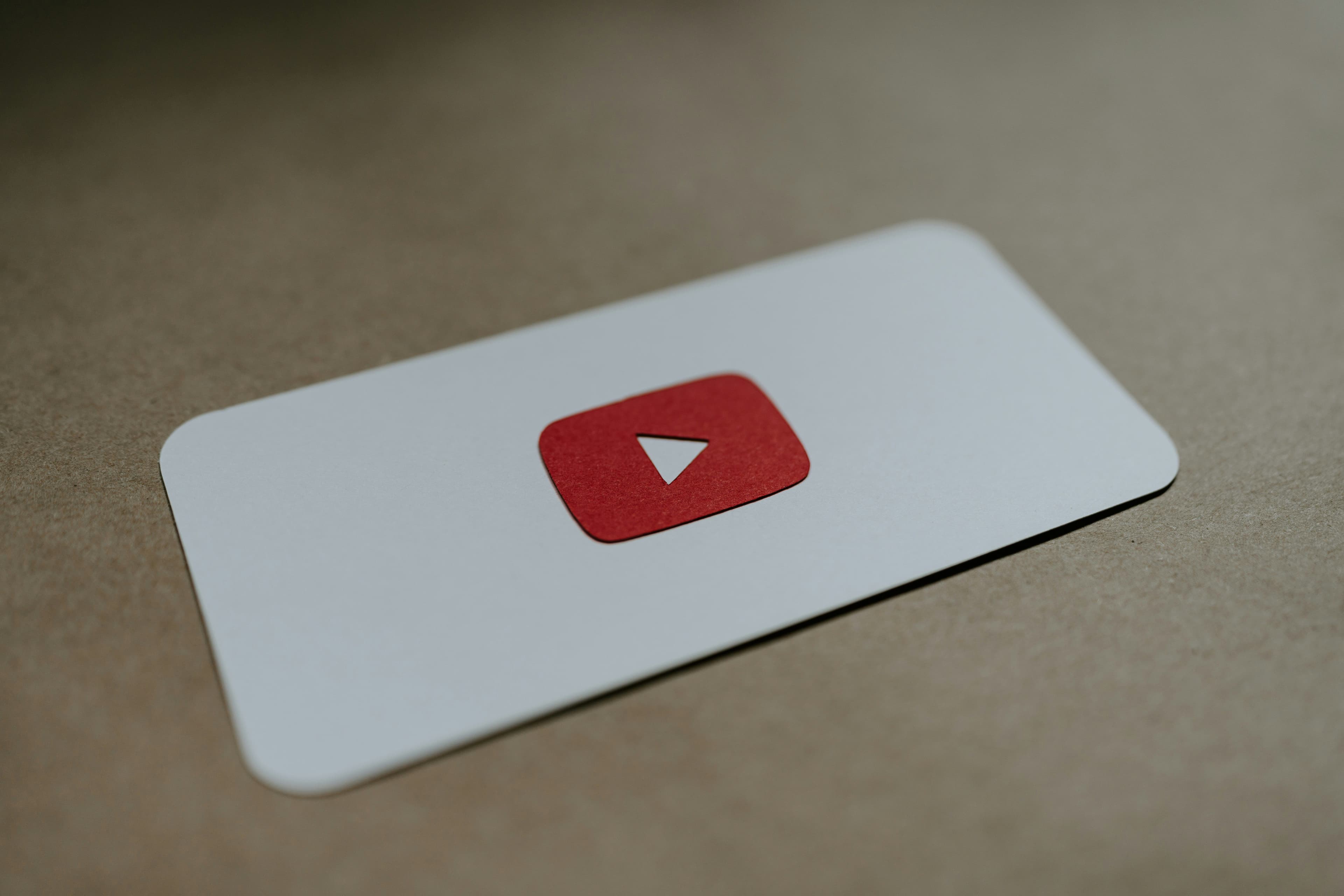 Main Image: Youtube icon set on a white carton