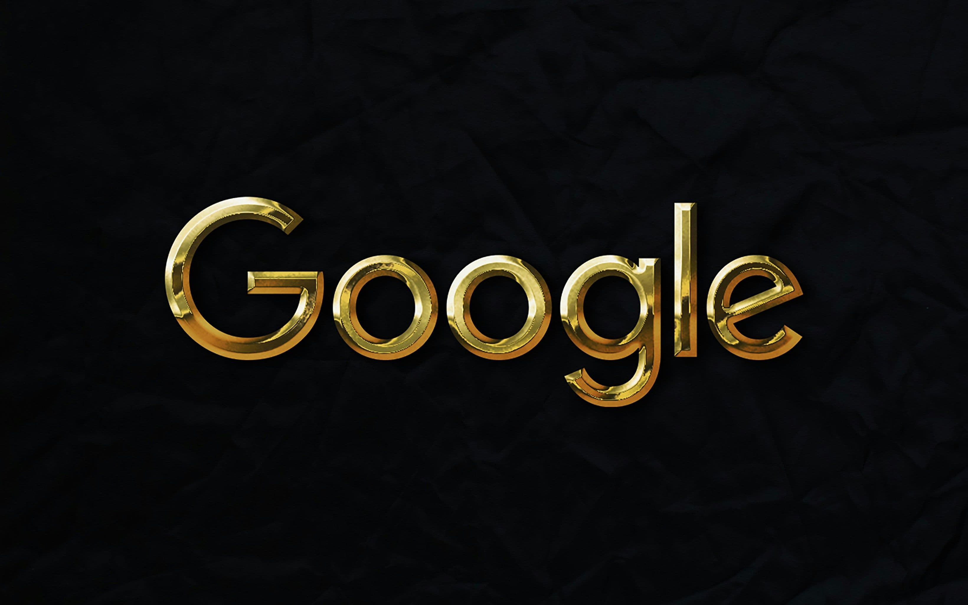 Main image. Golden google logo on a black background