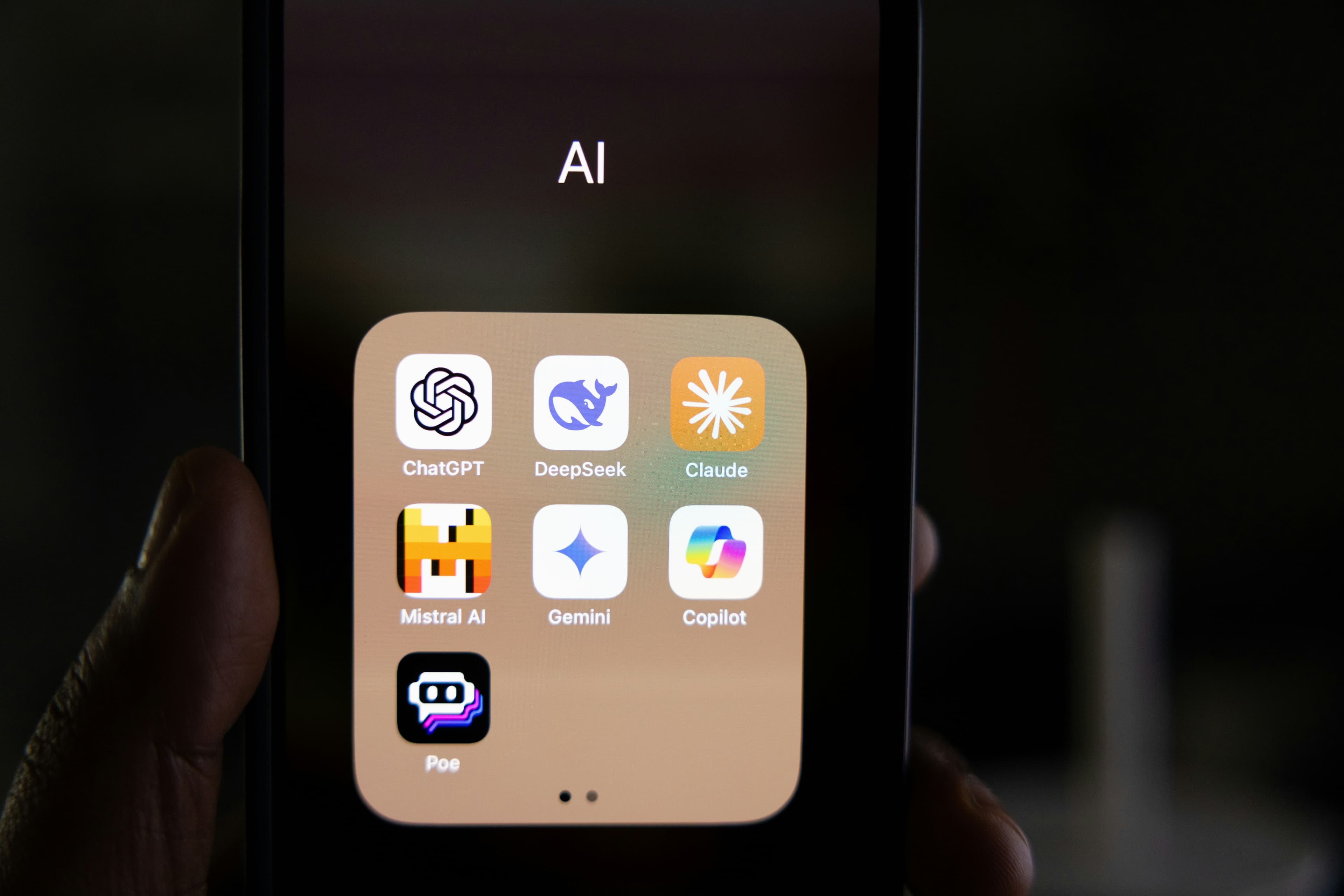 Main Image: Image of a smart phone screen containing icons of AI platforms